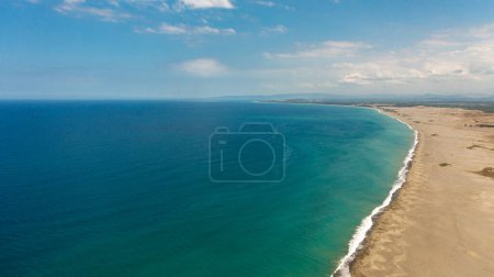 Photo for Sandy beach and ocean with waves. Paoay Sand Dunes, Ilocos Norte, Philippines. - Royalty Free Image