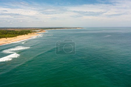 Photo for Wide sandy beach with ocean surf and waves. Sri Lanka. - Royalty Free Image