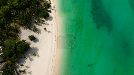 Photo for Sandy beach and blue sea in a tropical resort. Bantayan island, Philippines. - Royalty Free Image