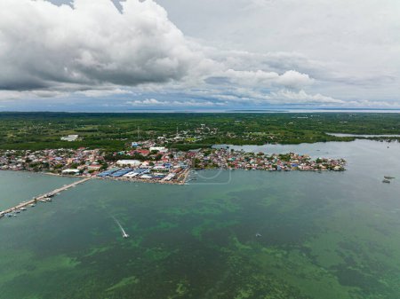 Photo for Aerial drone of coastal town on Bantayan Island. Philippines. - Royalty Free Image
