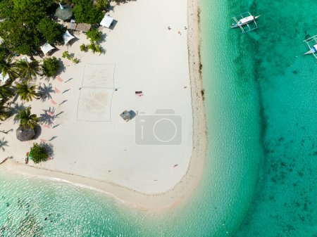 Photo for Top view of beautiful beach, palm trees by turquoise water. Bantayan island, Philippines. - Royalty Free Image