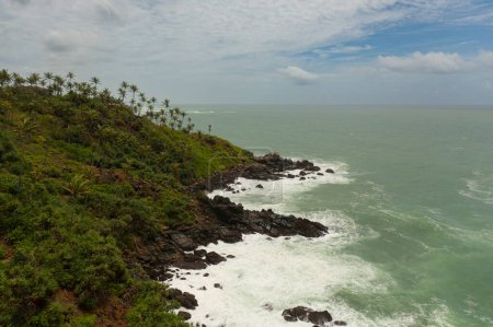 Photo for Seascape: Ocean waves roll on the rocky shore and beach. Travel concept. Secret Beach Mirissa, Sri Lanka. - Royalty Free Image