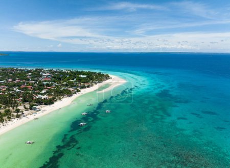 Photo for Flying over a beautiful sandy beach and a blue ocean. Bantayan island, Philippines. - Royalty Free Image