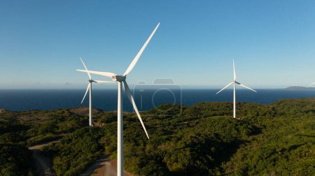 Photo for Top view of Wind Farm with wind turbines on the seashore. Wind power plant. Philippines. - Royalty Free Image