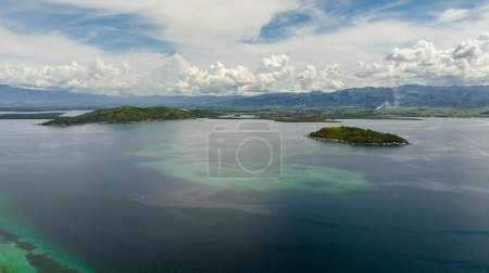 Foto de Aerial drone of blue sea and Negros island view from the sea. Filipinas. - Imagen libre de derechos