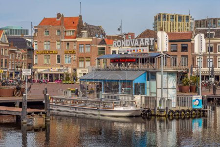 Photo for Leiden, Netherlands - March 17, 2023: View of Beestenmarkt with tour boat in the center of Leiden, Netherlands - Royalty Free Image