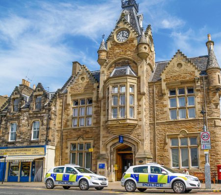 Photo for Portobello Beach Scotland - June 25 2009; Traditional structure of listed building housing Police Station with two police cars parked. - Royalty Free Image