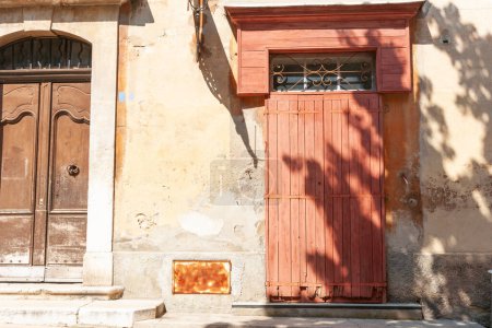 Photo for Old weathered wooden doors in ancient town street  Saint Paul de Vence, Provence,  France. - Royalty Free Image
