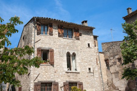 Photo for Old Italian architecture in stone residential building Saint Paul de Vence, Provence,  France. - Royalty Free Image
