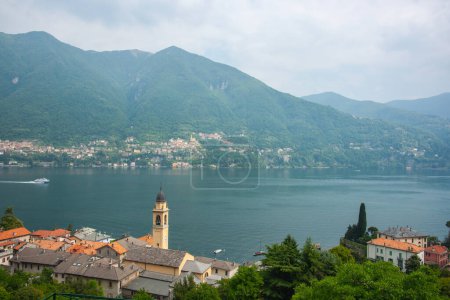 Photo for Porlezza village in foreground of landscape view across Lake Como Italy. - Royalty Free Image