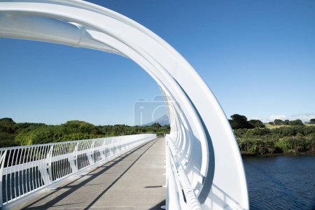 White steel Te Rewa Rewa Bridge landmark on Coastal Walkway in New Plymouth Taranaki.