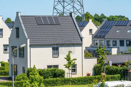 Photo for Sliedrecht, The Netherlands, 03.06.2023, Modern residential neighbourhood in Sliedrecht, view of houses with solar panels - Royalty Free Image