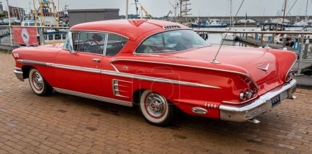 Photo for Lelystad, The Netherlands, 18.06.2023, Rear view of classic Chevrolet Impala from 1958 at The National Oldtimer Day - Royalty Free Image