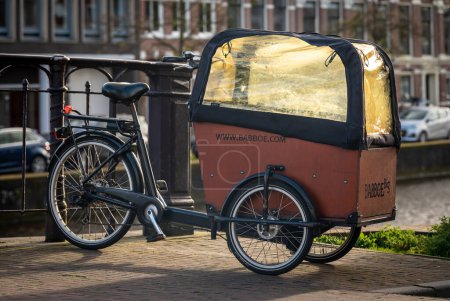 Haarlem, The Netherlands, 20.04.2024, The Babboe Big three-wheel cargo bike with a large box for children