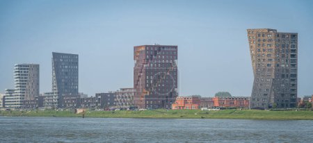 Skyline of Het Balkon neighbourhood in Maassluis, seen from Nieuwe Waterweg ship canal