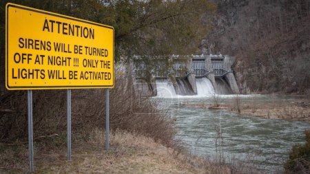Warning sign in front of Fort Patrick Henry Dam, located in Sullivan County in Kingsport, Tennessee on the South Fork Holston River.