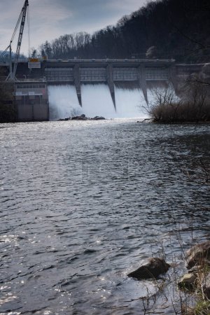 Wilbur Dam spilling water in early spring. Providing power generation and outdoor recreational activities.