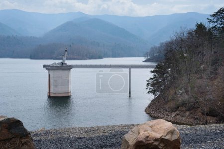View of hydroelectric facility intake gate tower from the Appalachian Trail which crosses the top of Watauga dam.