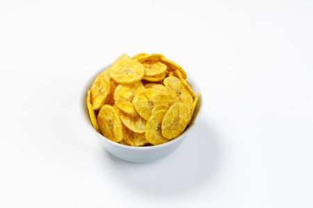 Photo for Kerala chips or Banana chips, cult snack item of Kerala,Arranged in a grey ceramic bowl,Isolated image with white background - Royalty Free Image