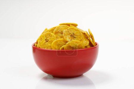 Photo for Kerala chips or Banana chips, cult snack item of Kerala, arranged in red bowl,Isolated image with white background - Royalty Free Image