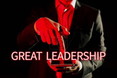 Photo for Writing displaying text Great Leadership, Concept meaning gather either formally or informally to bring up ideas Man Holding Tablet And Pointing With One Finger On Important Message - Royalty Free Image