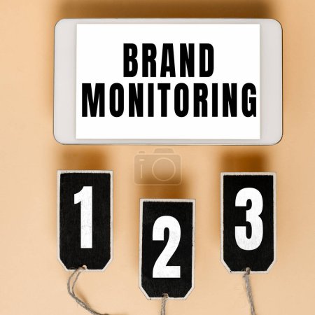 Photo for Text sign showing Brand Monitoring, Business overview process to proactively monitor the brand reputation - Royalty Free Image