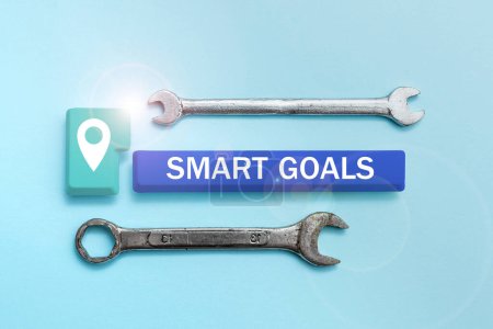 Photo for Text showing inspiration Smart Goals, Business overview mnemonic used as a basis for setting objectives and direction - Royalty Free Image