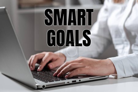 Photo for Text sign showing Smart Goals, Business overview mnemonic used as a basis for setting objectives and direction - Royalty Free Image
