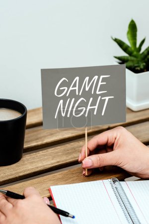 Photo for Writing displaying text Game Night, Concept meaning event in which folks get together for the purpose of getting laid - Royalty Free Image