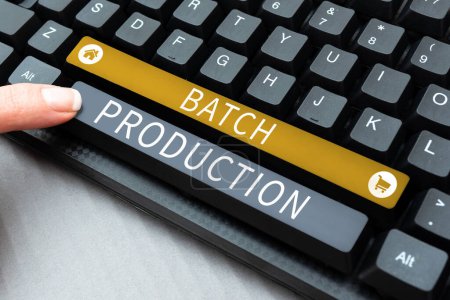 Photo for Sign displaying Batch Production, Word for products are manufactured in groups called batches - Royalty Free Image