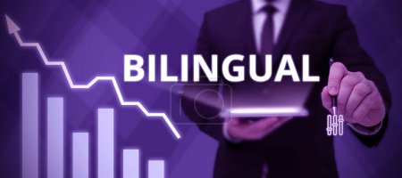 Foto de Signo de texto que muestra Bilingüe, Idea de negocio usando o capaz de usar dos idiomas, especialmente con igual fluidez - Imagen libre de derechos
