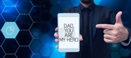 Photo for Hand writing sign Dad, You Are My Hero, Concept meaning Admiration for your father love feelings compliment - Royalty Free Image