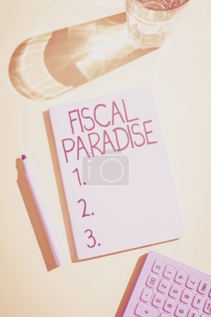 Foto de Señal de texto que muestra el paraíso fiscal, concepto de negocio Impuesto sobre el desarrollo Tasas de imposición para los inversores extranjeros - Imagen libre de derechos