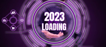 Photo for Text showing inspiration 2023 Loading, Word for Advertising the upcoming year Forecasting the future event - Royalty Free Image