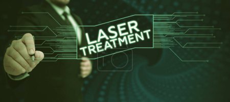 Téléchargez les photos : Signe d'écriture à la main Traitement laser, photo conceptuelle l'une des diverses techniques médicales et chirurgicales à l'aide de lasers - en image libre de droit