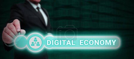 Foto de Texto que presenta Economía Digital, Concepto que significa actividades económicas que se basan en tecnologías digitales - Imagen libre de derechos