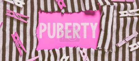 Photo for Writing displaying text Puberty, Internet Concept the period of becoming first capable of reproducing sexually - Royalty Free Image
