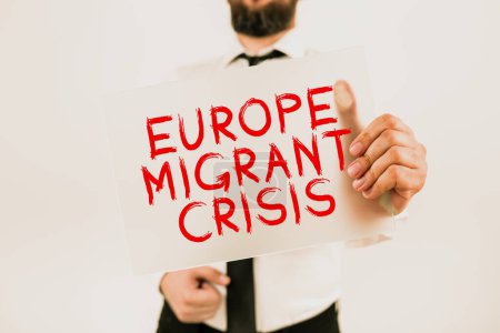 Photo for Inspiration showing sign Europe Migrant Crisis, Word Written on European refugee crisis from a period beginning 2015 - Royalty Free Image