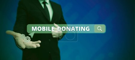 Téléchargez les photos : Légende textuelle présentant le don mobile, idée d'entreprise pour donner quelque chose à un organisme de bienfaisance ou toute autre cause à l'aide d'appareils personnels - en image libre de droit