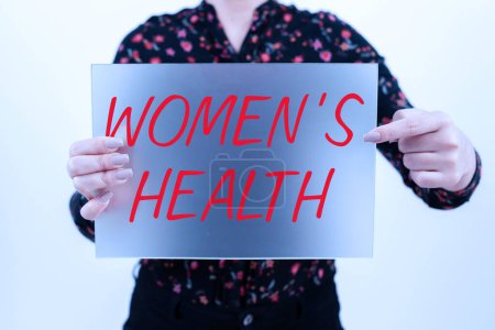 Foto de Señal que muestra la salud de las mujeres, Palabra escrita en consecuencias de salud física de las mujeres evitando la enfermedad - Imagen libre de derechos