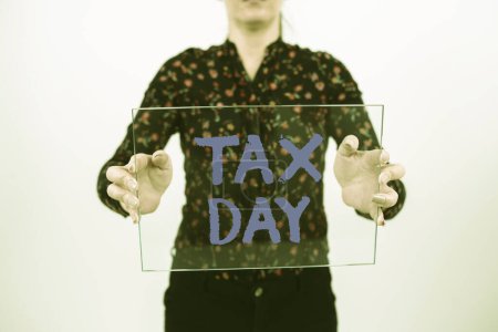 Téléchargez les photos : Légende conceptuelle Journée de l'impôt, Aperçu de l'entreprise terme familier pour désigner le temps pendant lequel les déclarations de revenus des particuliers - en image libre de droit