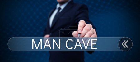 Foto de Texto que presenta Man Cave, Internet Concept una habitación, espacio o área de una vivienda reservada para una persona masculina - Imagen libre de derechos