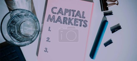 Photo for Text sign showing Capital Markets, Business approach Allow businesses to raise funds by providing market security - Royalty Free Image