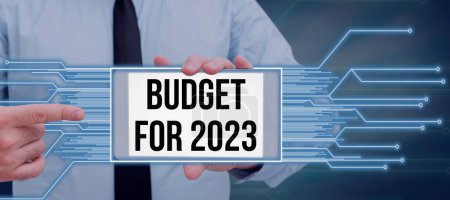 Téléchargez les photos : Légende textuelle présentant le budget de 2023, Word for An written estimates of revenue and expenditure for 2023 - en image libre de droit