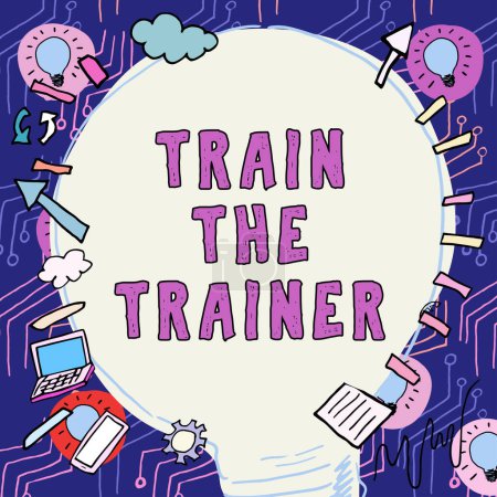 Foto de Letrero de texto que muestra Train The Trainer, palabra identificada para enseñar mentor o entrenar a otros que asisten a clase - Imagen libre de derechos