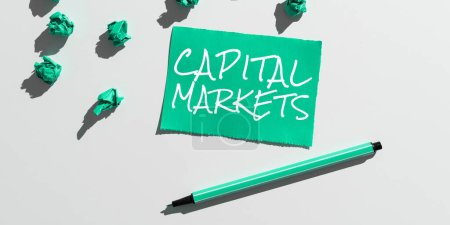 Photo for Text sign showing Capital Markets, Concept meaning Allow businesses to raise funds by providing market security - Royalty Free Image