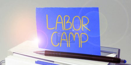 Photo for Writing displaying text Labor Camp, Concept meaning a penal colony where forced labor is performed - Royalty Free Image