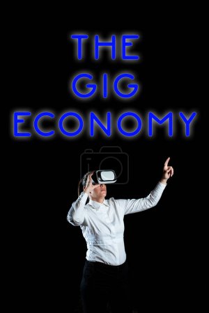 Handschriftlicher Text Die Gig Economy, Geschäftsidee Markt der kurzfristigen Verträge Freiberufler Zeitarbeit