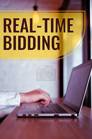 Photo for Hand writing sign Real Time Bidding, Business showcase Buy and sell advertising inventory by instant auctions - Royalty Free Image