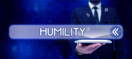 Téléchargez les photos : Signe d'écriture à la main Humilité, concept signifiant être humble est une vertu de ne pas se sentir trop supérieur - en image libre de droit